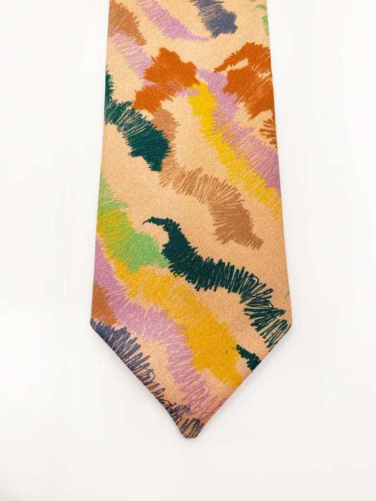 A necktie crafted from high-quality cotton with an abstract design inspired by the rolling hills and earthy tones of the desert.