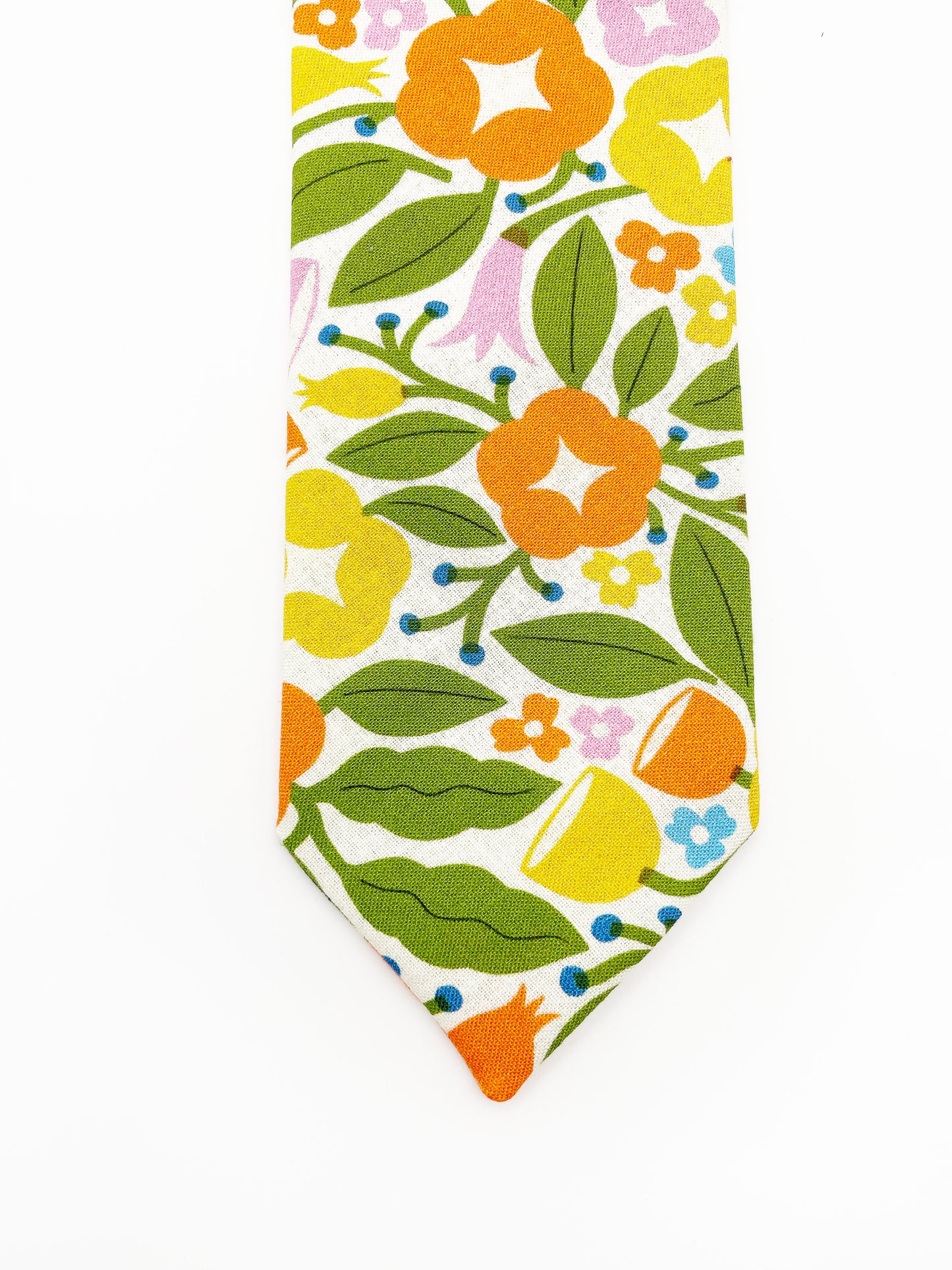 A vibrant necktie with bold yellow, orange, and pink flowers.