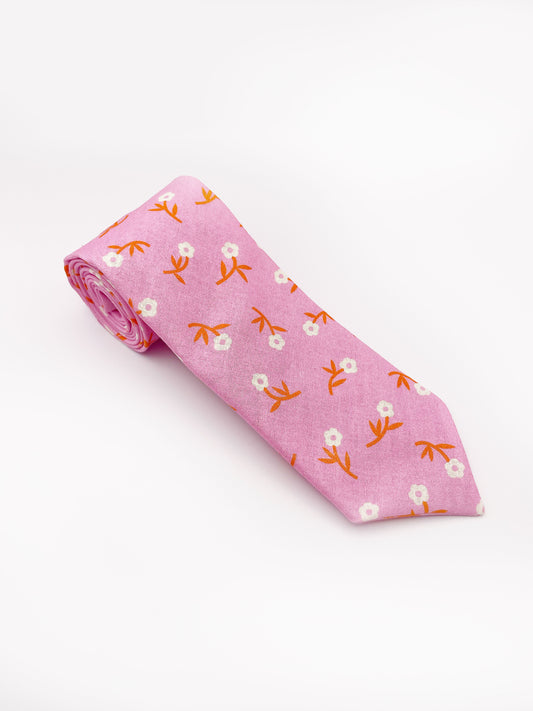A pink necktie with orange-stemmed flowers.
