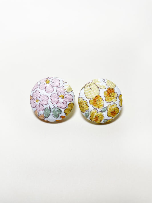 Handmade yellow floral fabric covered post earrings.