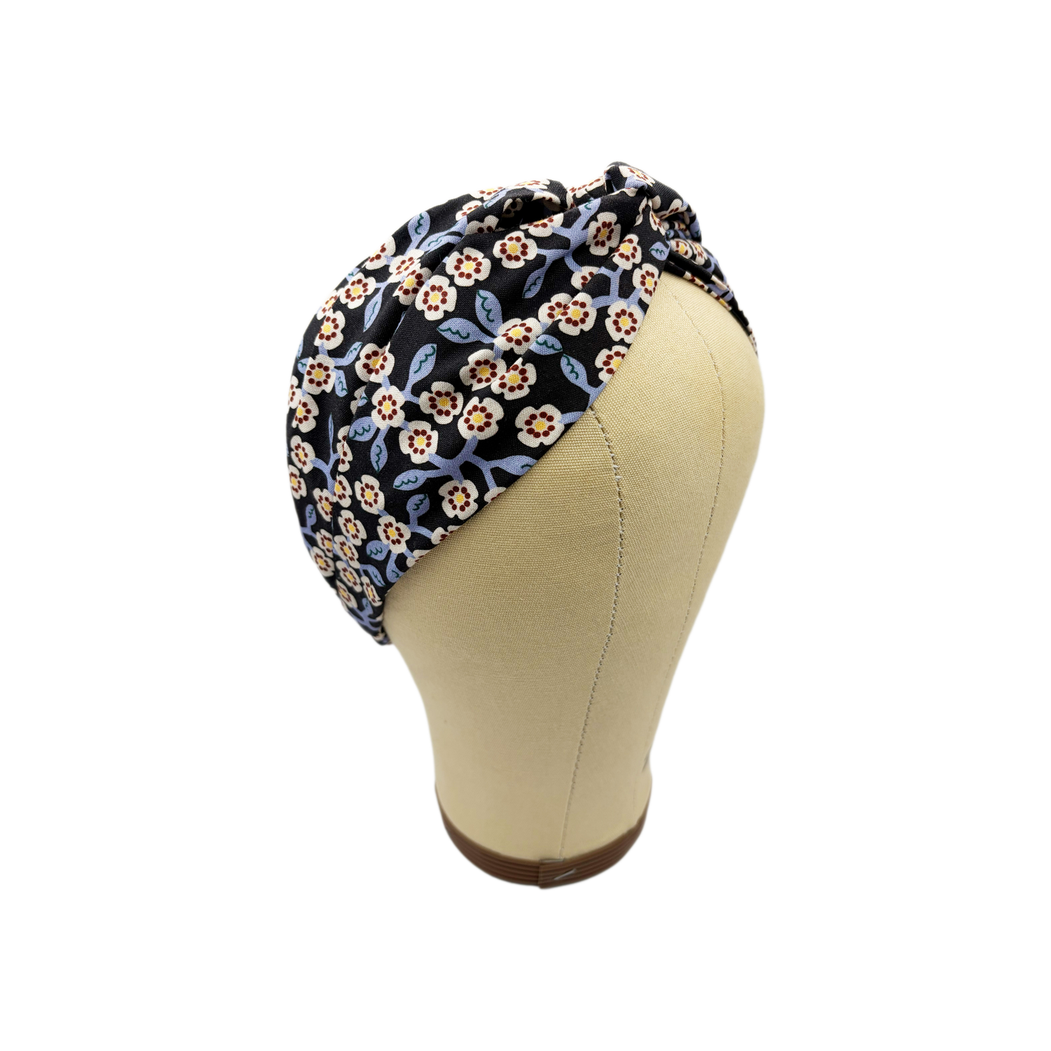 A boho floral twisted headband.