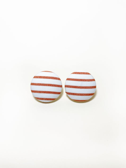 Handmade copper striped fabric covered post earrings.