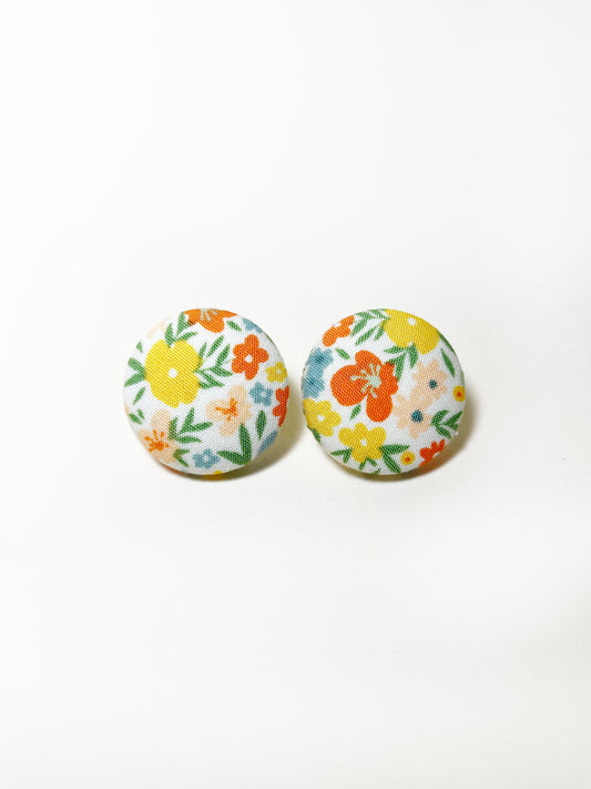 Handmade ditsy floral fabric covered post earrings.