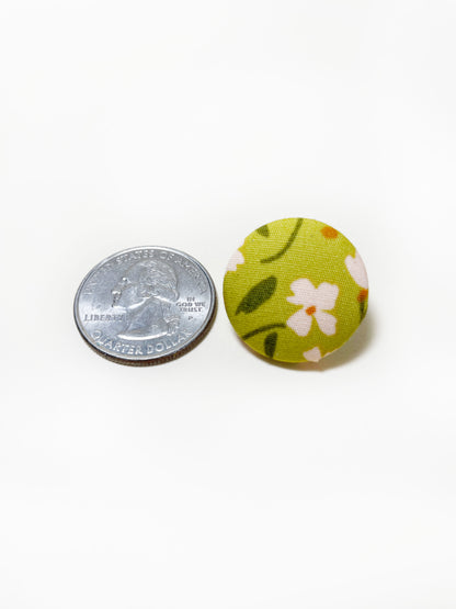 Handmade green floral fabric covered lapel pin. The earrings are 0.875 inches, roughly the same size as a quarter.