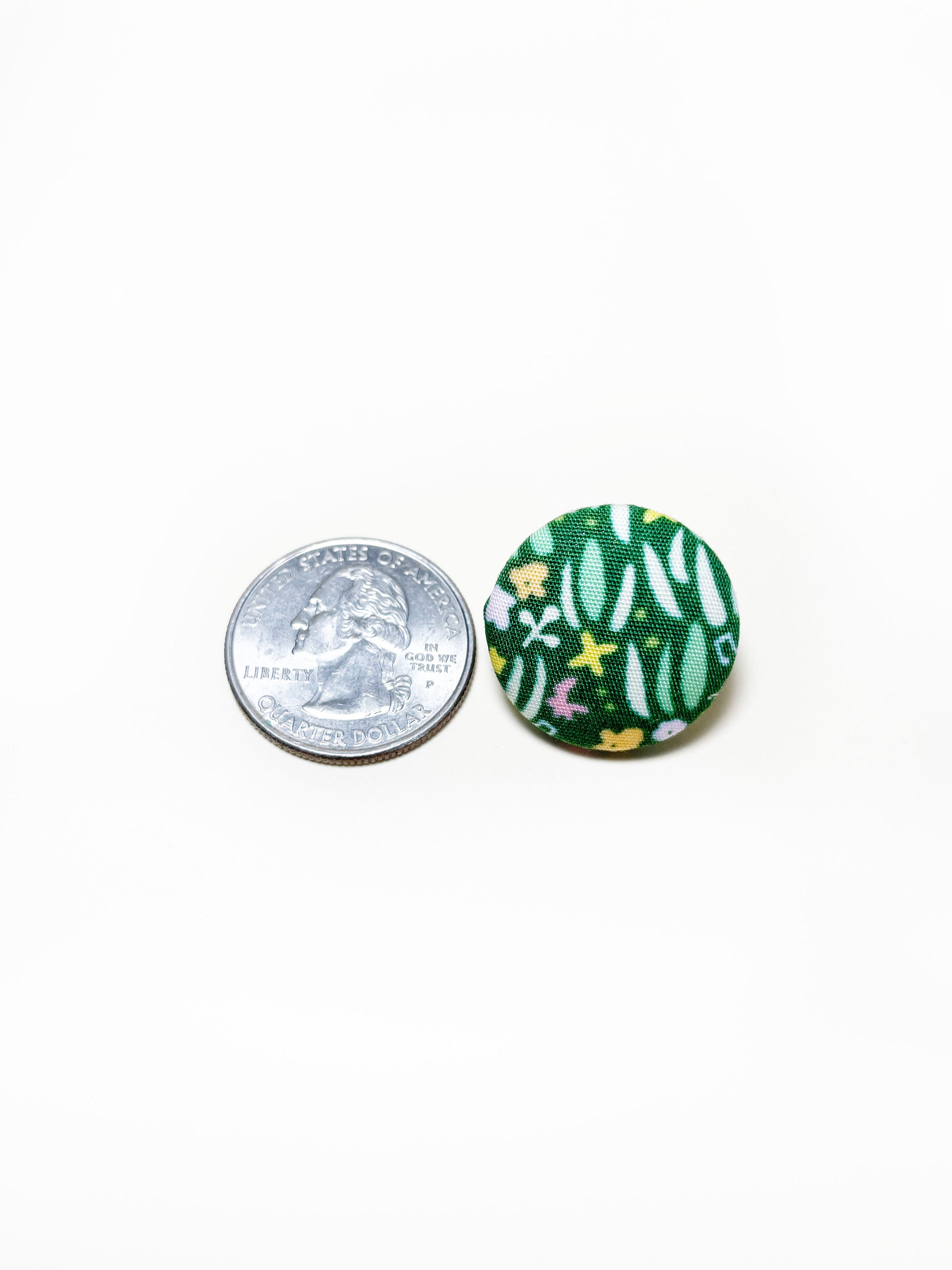 Handmade green floral fabric covered lapel pin. The earrings are 0.875 inches, roughly the same size as a quarter.