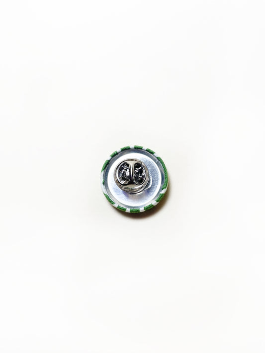 Handmade green striped fabric covered lapel pin. Each pin has a clutch back closure.