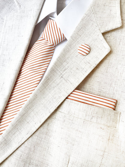 A handmade copper striped boho necktie.