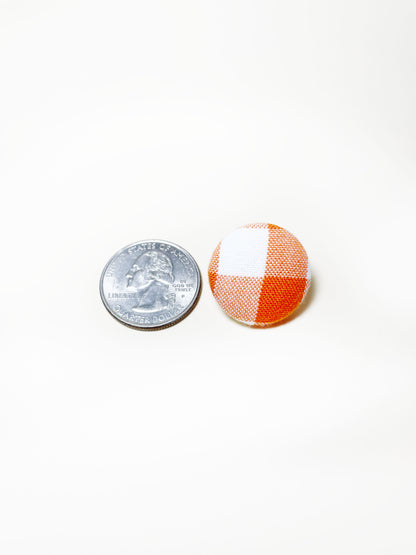 Handmade orange gingham plaid fabric covered lapel pin. The earrings are 0.875 inches, roughly the same size as a quarter.