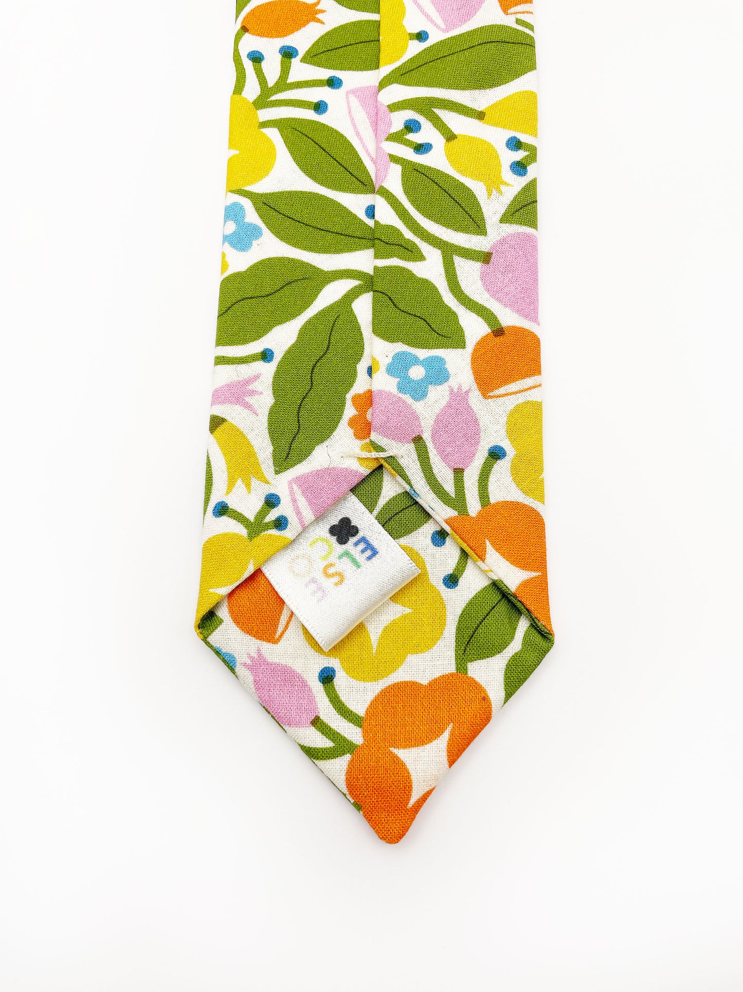 A vibrant necktie with bold yellow, orange, and pink flowers.
