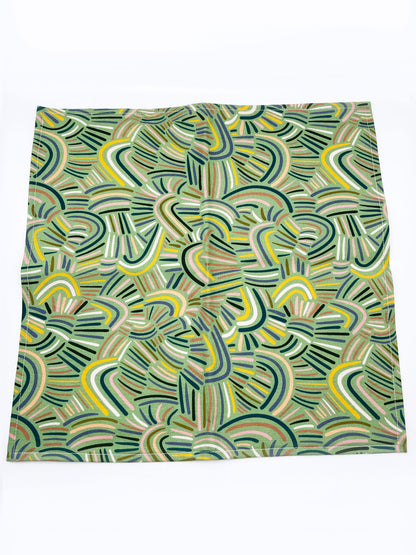 A pocket square made from high-quality cotton with an abstract design inspired by desert rain patterns.