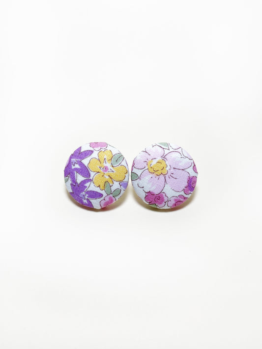 Handmade purple floral fabric covered post earrings.