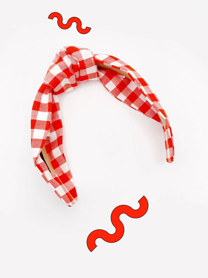 Cotton knotted headbands with a vibrant red gingham plaid print. 