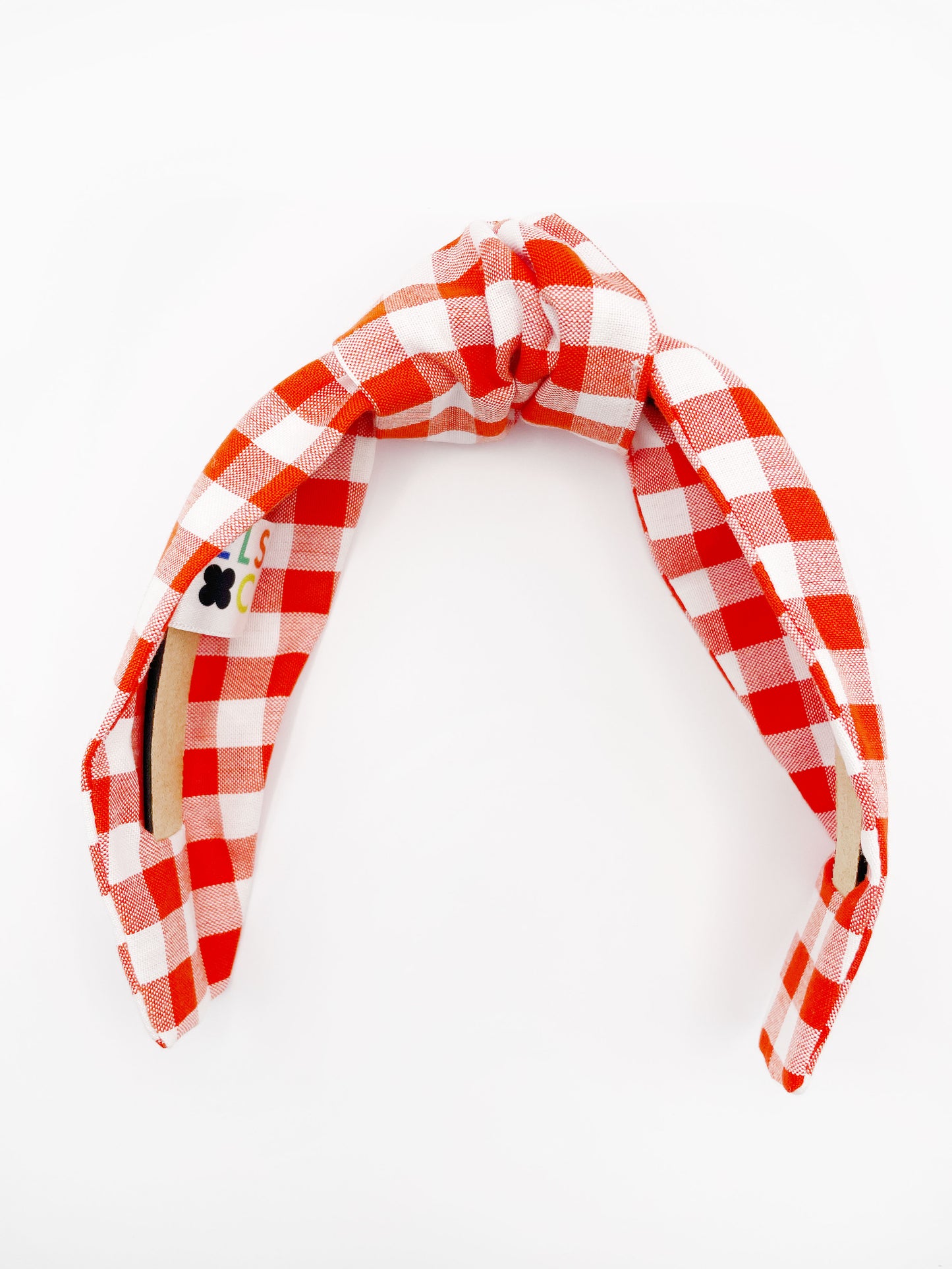 Cotton knotted headbands with a vibrant red gingham plaid print.