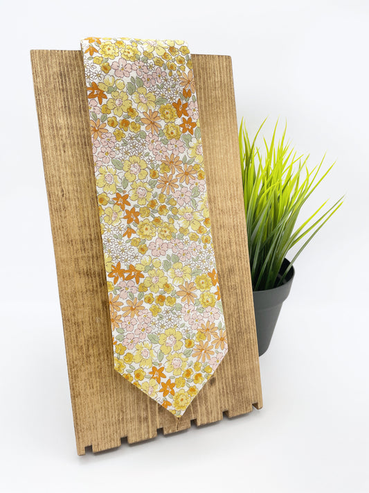 A handmade yellow floral necktie.