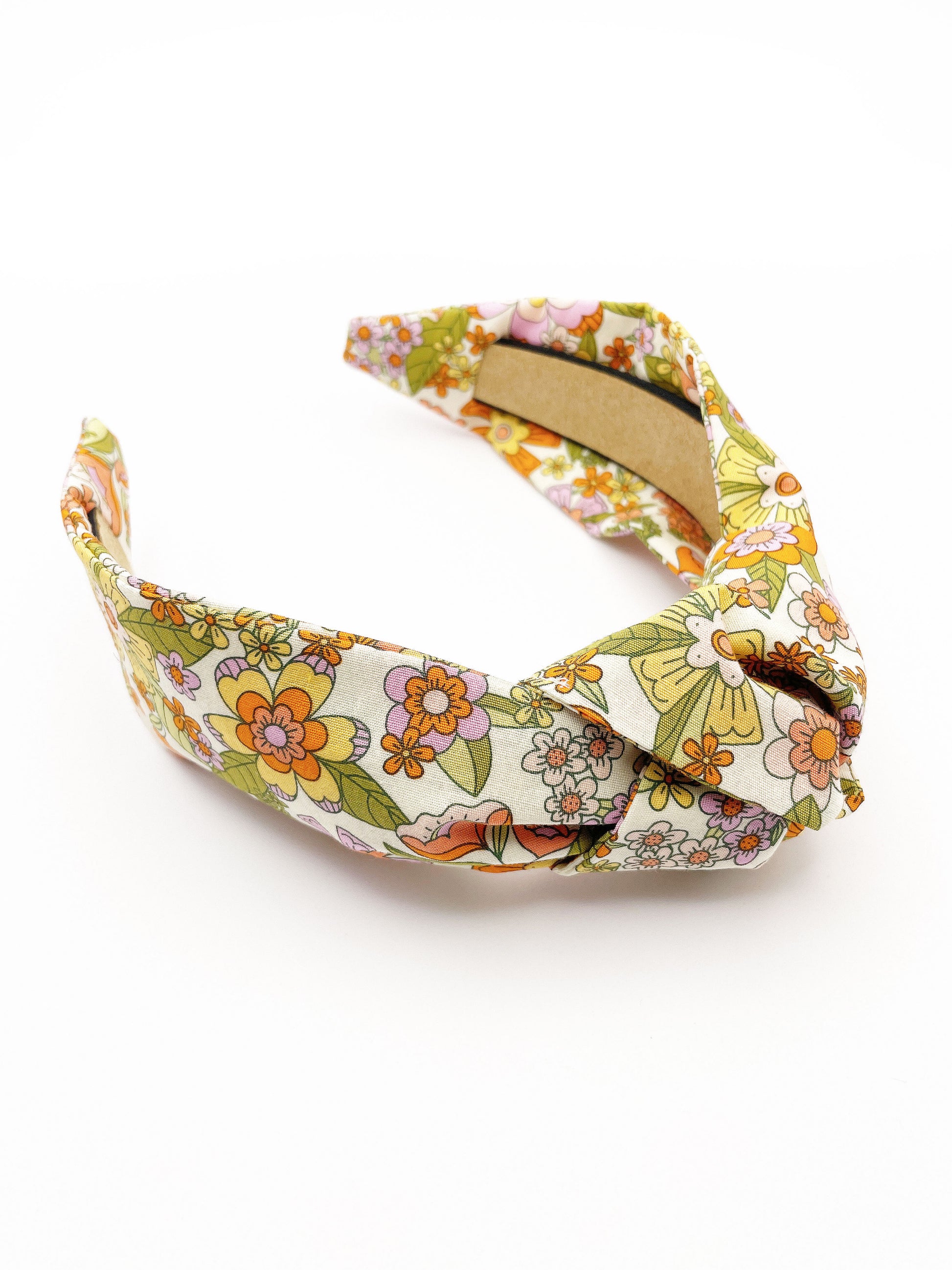 A handmade retro floral knotted headband.