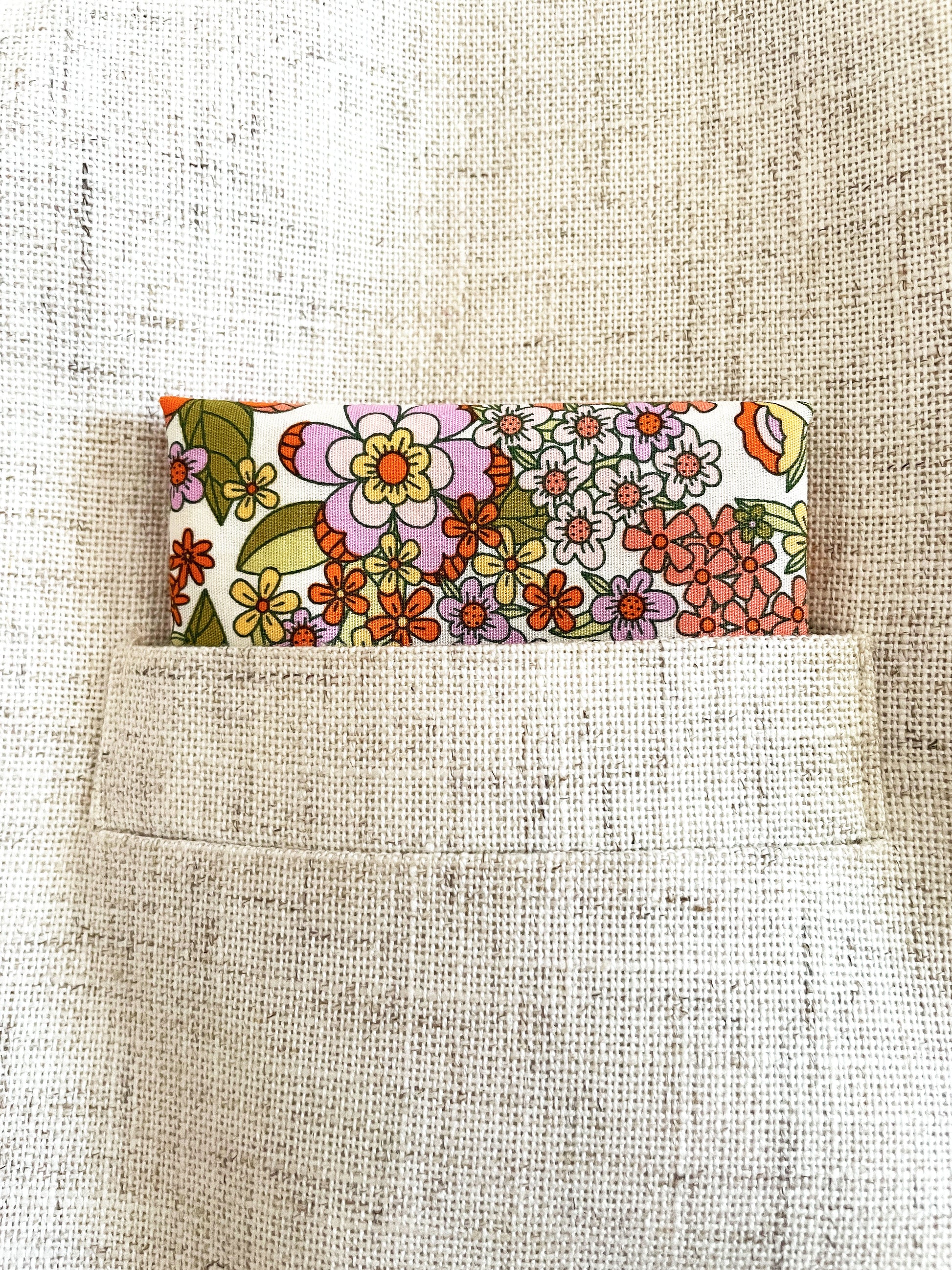 A handmade retro floral pocket square.