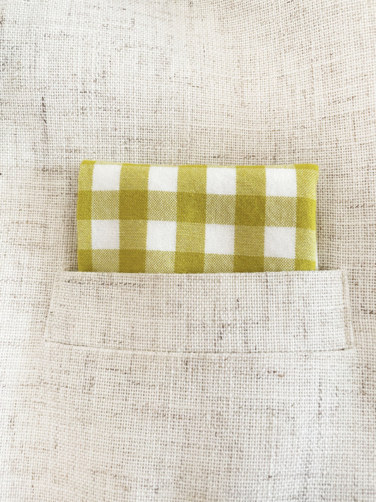 A green and white gingham plaid pocket square.